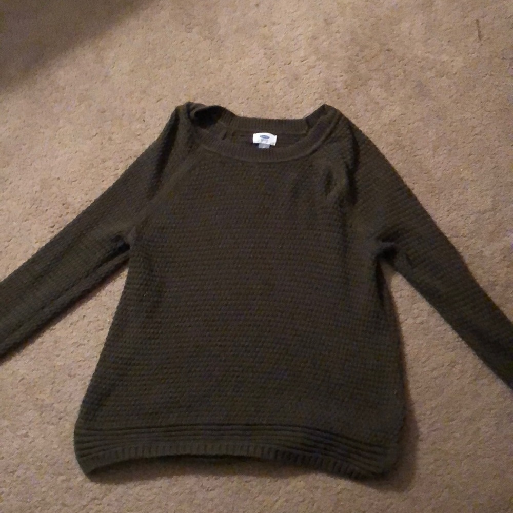 a olive green sweater